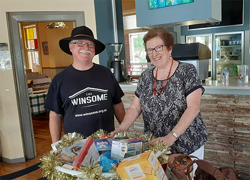 Sister Mary Bruggy, with items donated by her order / community